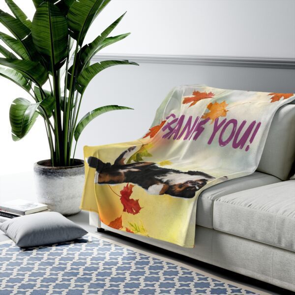 Berner thank you blanket displayed on sofa